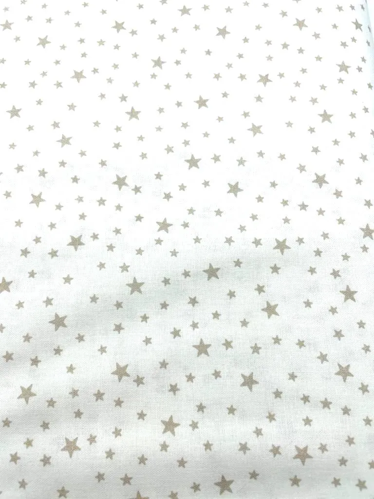 Tela algodón estampada con estrellas beige claro y fondo blanco — imagen 1